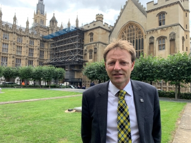 Derek outside Parliament